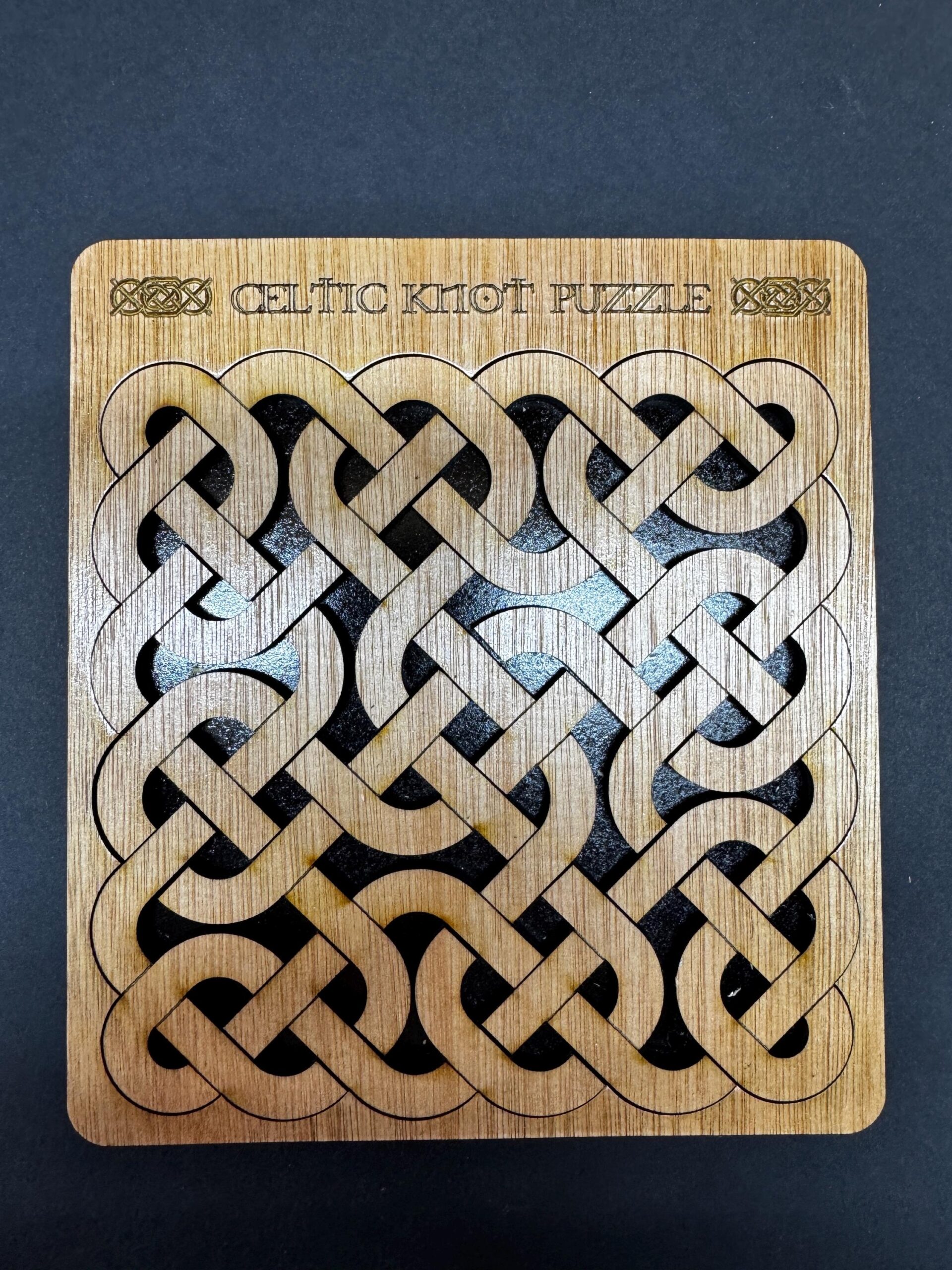 tree knot crossword clue