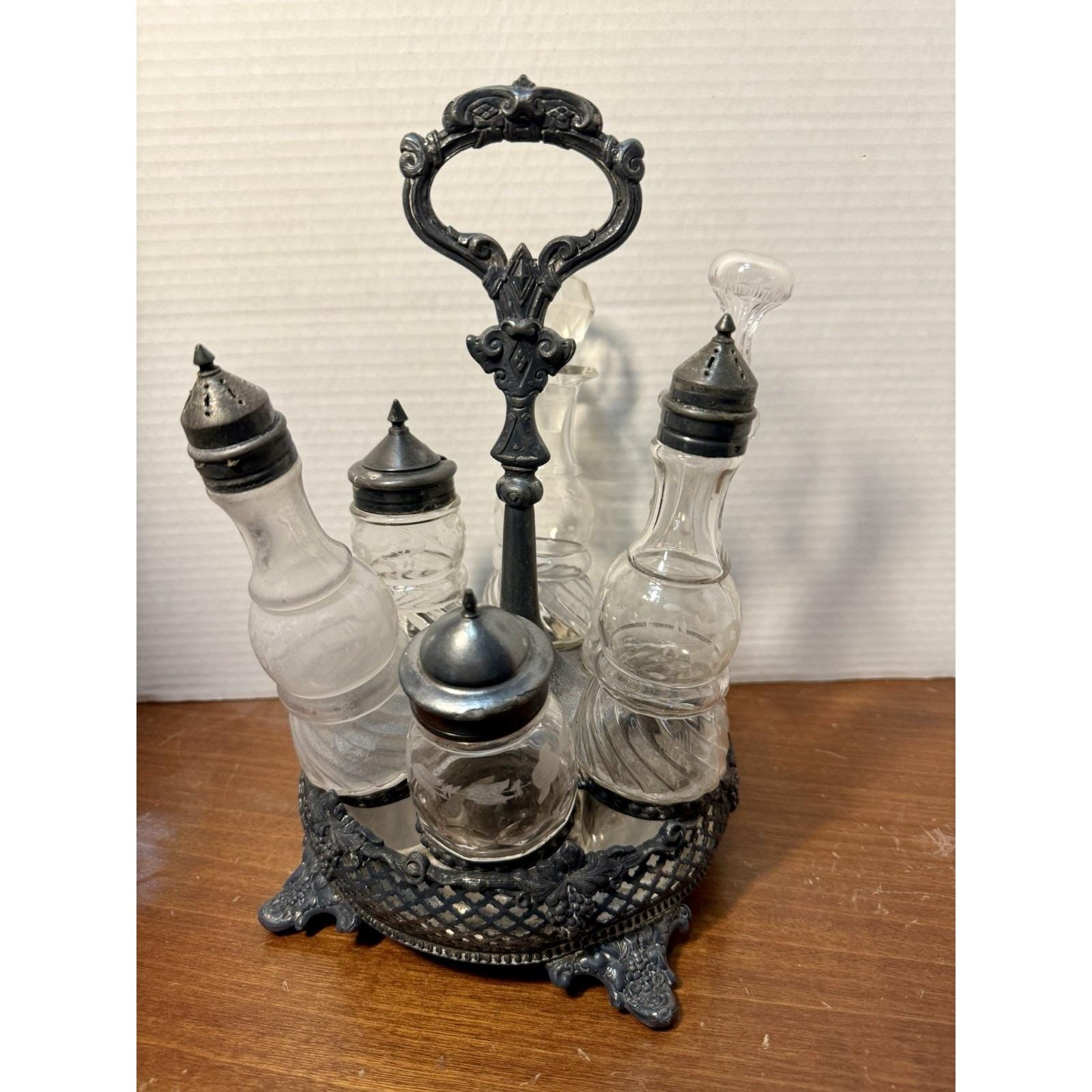 collection of matching cruets crossword